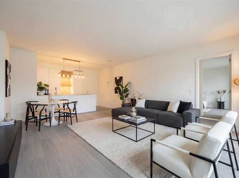Wonen in een gebouw van wereldfaam,  dat is wat dit uitzonderlijke appartement op de 2e verdieping van het BAN-project op Nieuw Zuid in Antwerpen te b