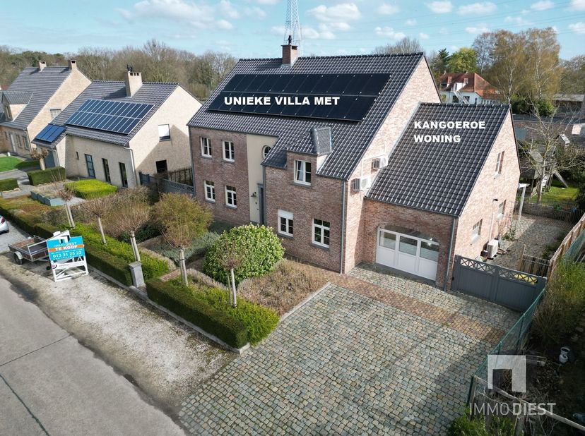 Charmante en bijzonder ruime gezinswoning met studio in Olmen op een terrein van 9a91 en bewoonbare oppervlakte van 450m²<br />
Welkom in deze pracht