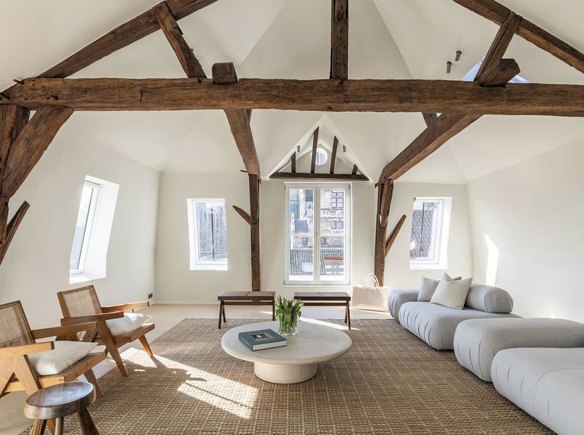 Penthouse exclusif de 188 m² env. avec une terrasse orientée sud et une vue panoramique sur la cathédrale Saint-Bavon, situé en plein cœur historique