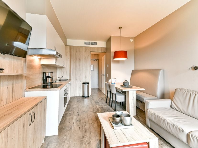 Ontdek dit sfeervol ingerichte appartement in het geliefde vakantiedomein Duinenzicht in Westende. Gelegen op korte wandelafstand van zee en strand, c
