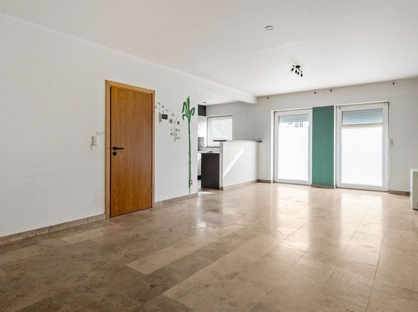 Appartement clé en main au rez-de-chaussée avec jardin<br />
Situation<br />
Cet appartement de plain-pied bénéficie d'une situation privilégiée à pro