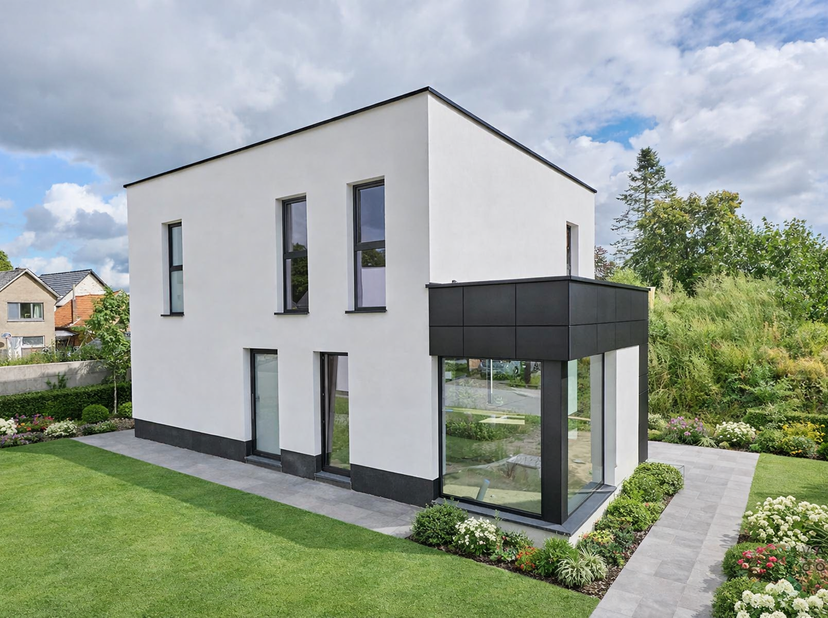 In een rustige, doodlopende woonstraat vlak bij het centrum van Hechtel bevindt zich deze moderne open bebouwing (lot 7). De ligging combineert rust m