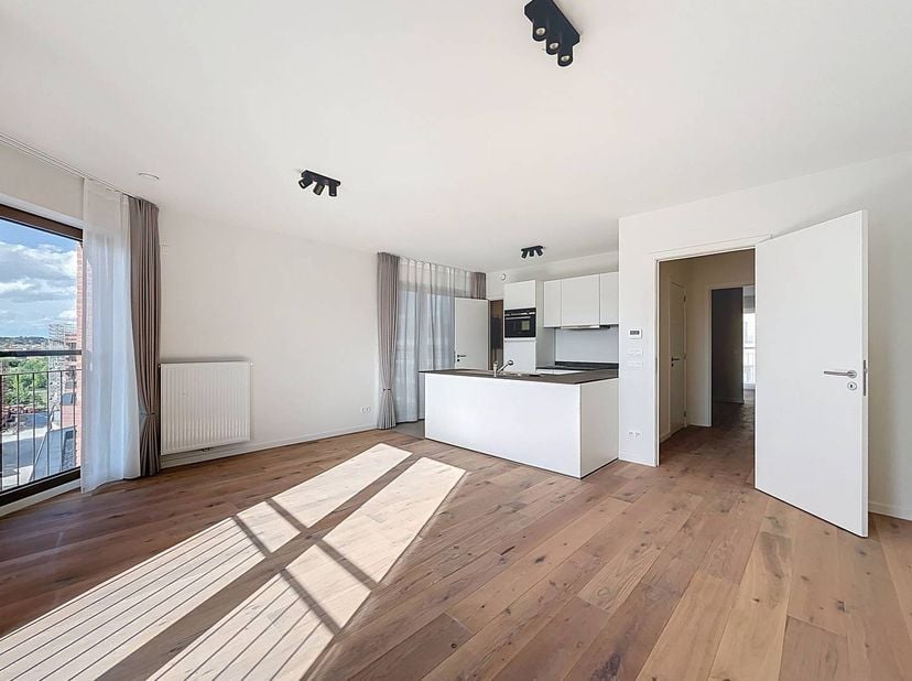 Appartement 1 slaapkamer op het eerste verdiep in de residentie 'Dayton' naast de nieuwe Brusselse hotspot 'Gare Maritime'. Dit appartement beschikt o