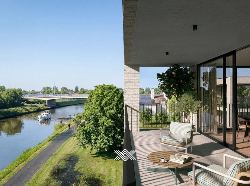 Dit tweeslaapkamerappartement met een oppervlakte van 106 m² is gelegen op het eerste verdiep van gebouw A. Het appartement beschikt over een inkomhal