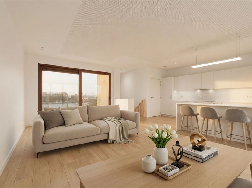 In uniek havengebied: prachtige duplex penthouse met 3 slaapkamers, gemeenschappelijke zwemvijver en zicht op het water<br />
<br />
Gelegen in een
