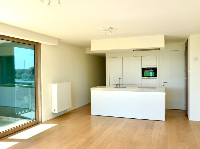 Te koop: modern appartement met open zicht in Sint-André (Oostduinkerke)  Rietveld Projects In het charmante Sint-André te Oostduinkerke bevindt zich