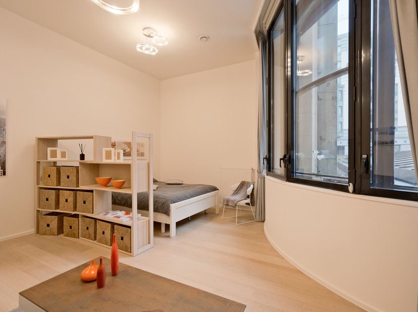 LUXE STUDIO VAN +/- 55 M² IN HET HART VAN BRUSSEL<br />
<br />
BRUSSEL: In het bruisende centrum van Brussel, in de wijk De Munt tegenover het Radisso