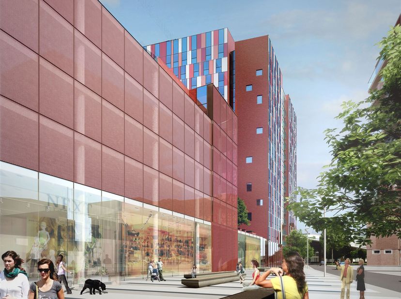 Deze studentenkamer is gelegen in een residentiële omgeving aan de Vaartkom in Leuven. Het gebouwencomplex omvat een commerciële parking, commerciële
