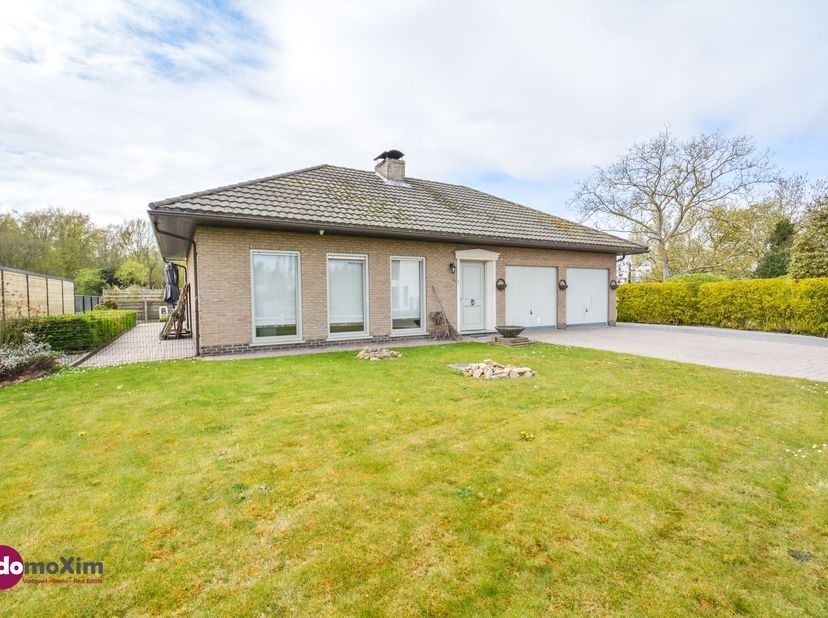 Charmant bungalow sur un beau terrain à Boortmeerbeek<br />
 <br />
Idéalement situé entre Louvain et Malines, ce charmant bungalow offre une combin