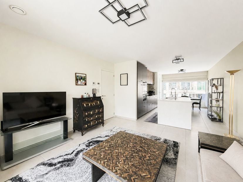 Appartement BEN-ÉCONOME EN ÉNERGIE avec TERRASSE SUD, PLACE DE PARKING PRIVATIVE et CAVE, idéalement situé sur l'ÎLE SCHELDE au CŒUR D'OUDENAARDE. Cet