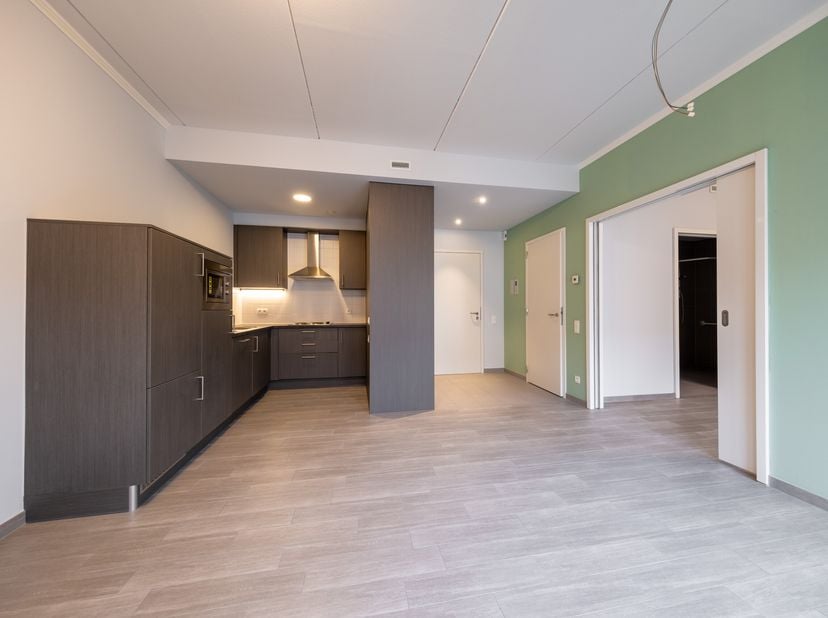 Zorgeloos wonen of beleggen in het centrum van Tienen?<br />
De site "De 2 Poorten" heeft een uitstekende ligging in een residentiële wijk in het stad