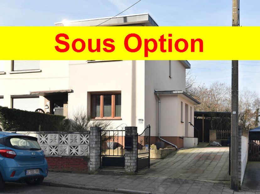 OUGREE - A VENDRE maison 2 chambres, cuisine, salon, salle de douches, véranda, WC séparé, caves, jardin. Possibilité réduction frais enregistrement.