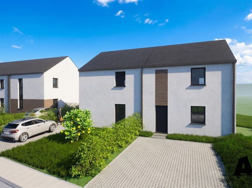 W Immobilière vous propose à Tintigny, une maison neuve contemporaine sur un terrain de plus de 614m². Cette maison 3 façades avec jardin offre tout l