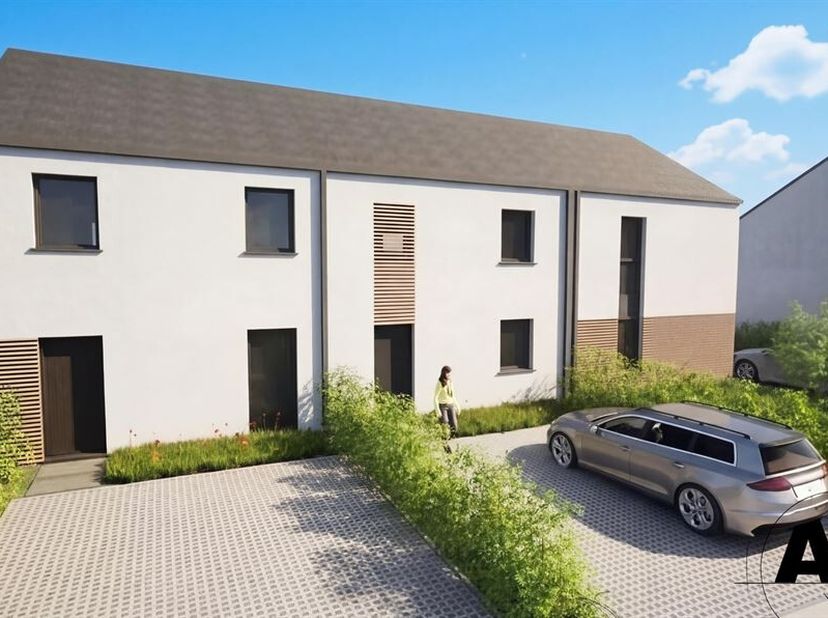 W Immobilière vous propose à Tintigny une maison neuve contemporaine 2 façades avec jardin, implantée sur un terrain de plus de 373 m². Située dans un