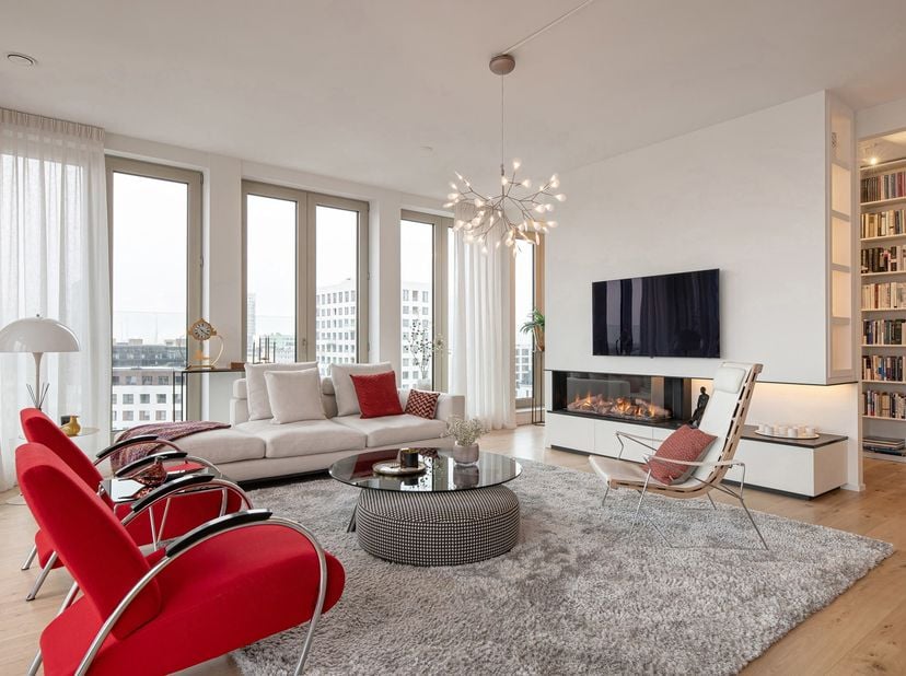 Luxueus wonen met panoramisch uitzicht nabij het Eilandje<br />
Ontdek dit uitzonderlijk afgewerkte penthouse waar architectuur, licht en verfijning s
