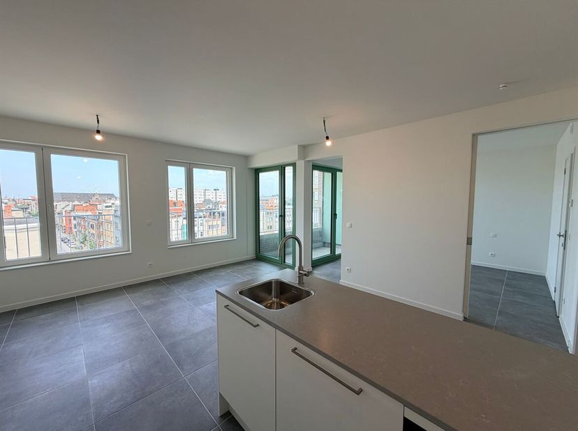 Situation : Appartement très bien situé sur la Slachthuislaan à Anvers, dans un quartier animé et en pleine expansion. L'emplacement offre un accès fa
