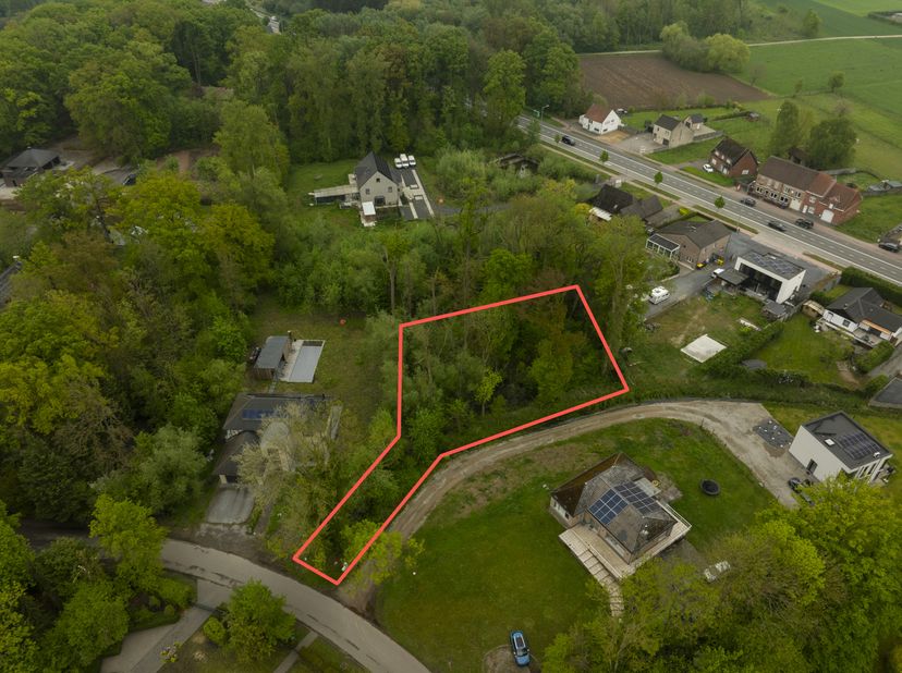 TE KOOP: Exclusieve en discreet gelegen bouwgrond mét vergunning in de prestigieuze Sparrendreef – Kampenhout<br />
Adres: Sparrendreef 7, 1910 Kampen