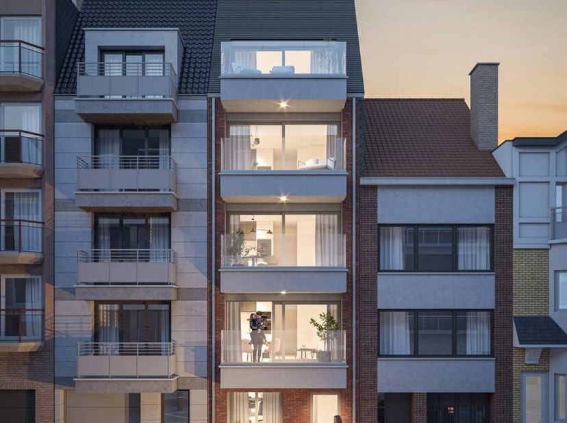 Nieuwbouw appartement met 3 slaapkamers, zongericht terras en zijdelings zeezicht te koop, gelegen op absolute toplocatie, op de eerste- en gelijkvloe