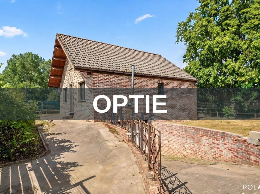 ***OPTION*** (En option)<br />
<br />
Cette maison individuelle de 1988 est située à Den Tomme, un quartier résidentiel calme et verdoyant où la natur