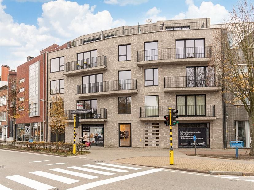 Situation : Residentie Hemelrijck, en plein centre de Brasschaat<br />
Description :<br />
Cette résidence a été construite dans une architecture cont