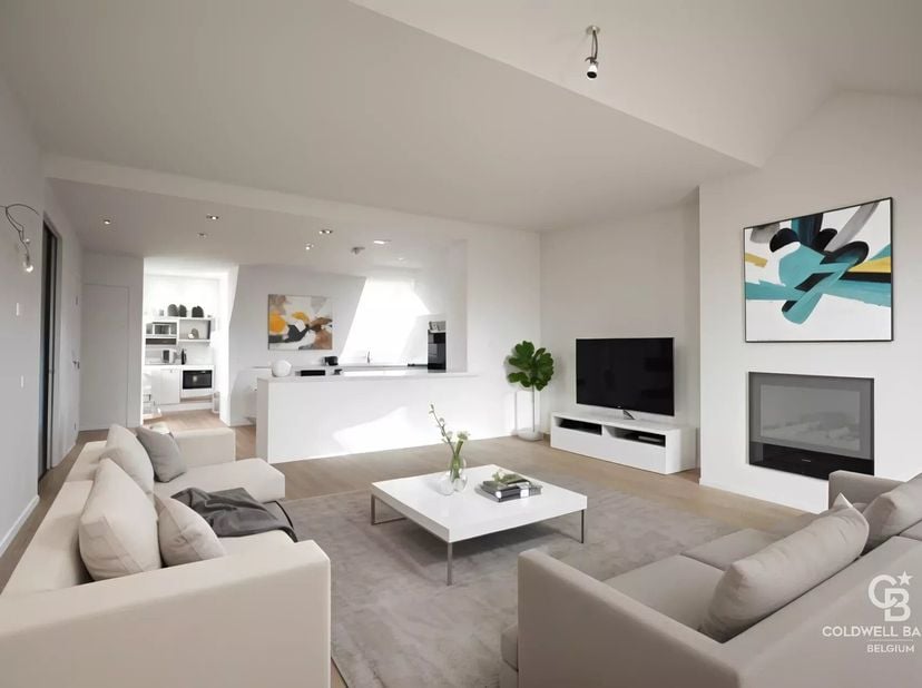 Appartement van 124 m² op de 4e en laatste verdieping, bestaande uit een inkomhal met kasten, ruime en lichte woonkamer met open haard, open ingericht