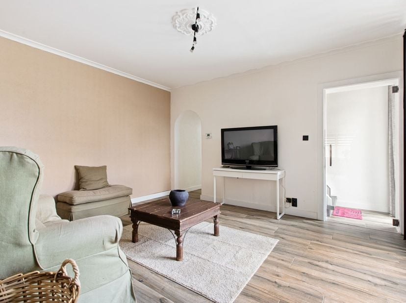 Instapklare, karaktervolle halfopen gezinswoning met 3 slaapkamers op een perceel van 588 m² in het rustige Mal, een groene deelgemeente van Tongeren-