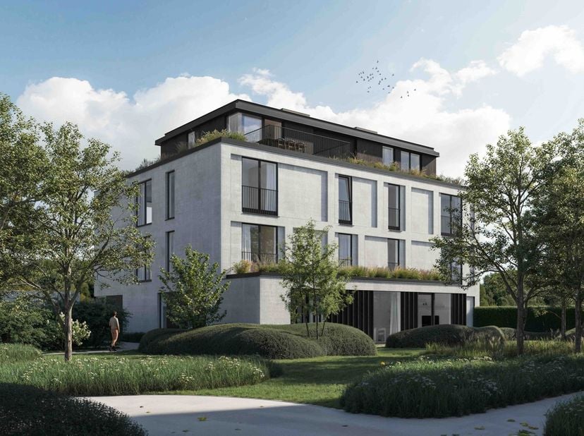 Dit stijlvolle 2-slaapkamerappartement combineert een doordachte indeling met hedendaags wooncomfort. Via de inkomhal met gastentoilet en praktische b