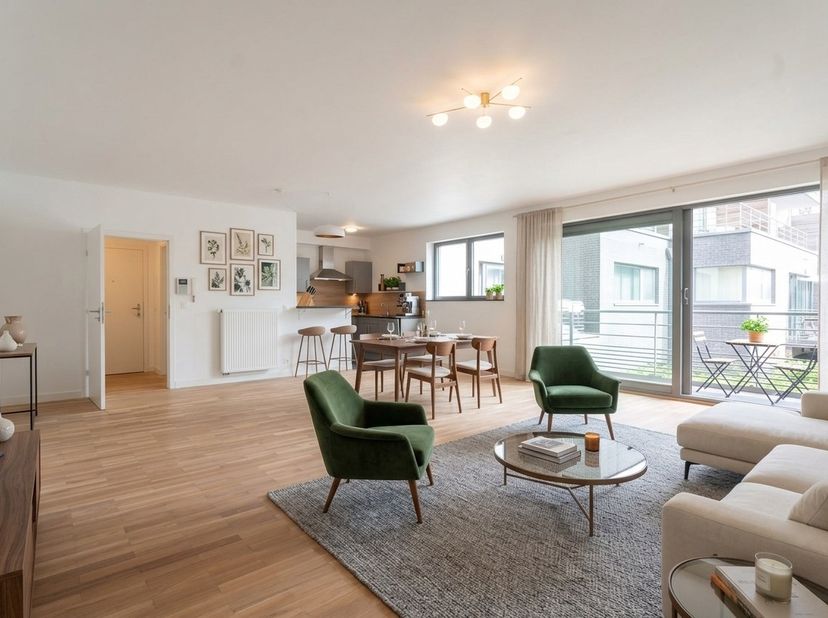 Gelegen op de eerste verdieping van een verzorgd gebouw, in het hart van Brussel, bevindt zich dit volledig gerenoveerde appartement met een bewoonbar