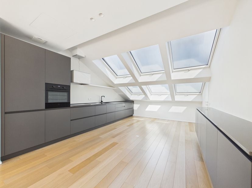 Botanique - Art-Loi CP1210| Hedendaags penthouse met 2 slaapkamers in een prestigieus herenhuis<br />
Gelegen in een elegant herenhuis dat met zorg vo