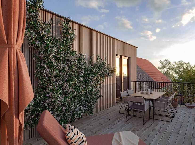 Evergreen se compose de 16 appartements neufs économes en énergie à Mortsel et attire immédiatement l'attention par son architecture moderne et intemp