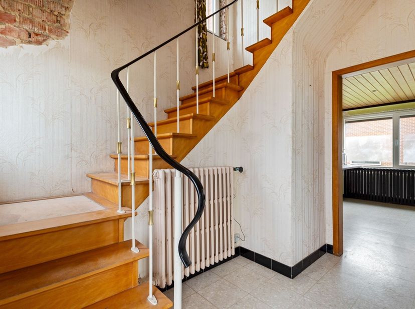 Ligging<br />
<br />
Gelegen in het rustige en groene Spalbeek, een deelgemeente van Hasselt, geniet deze woning van een aangename ligging met een v