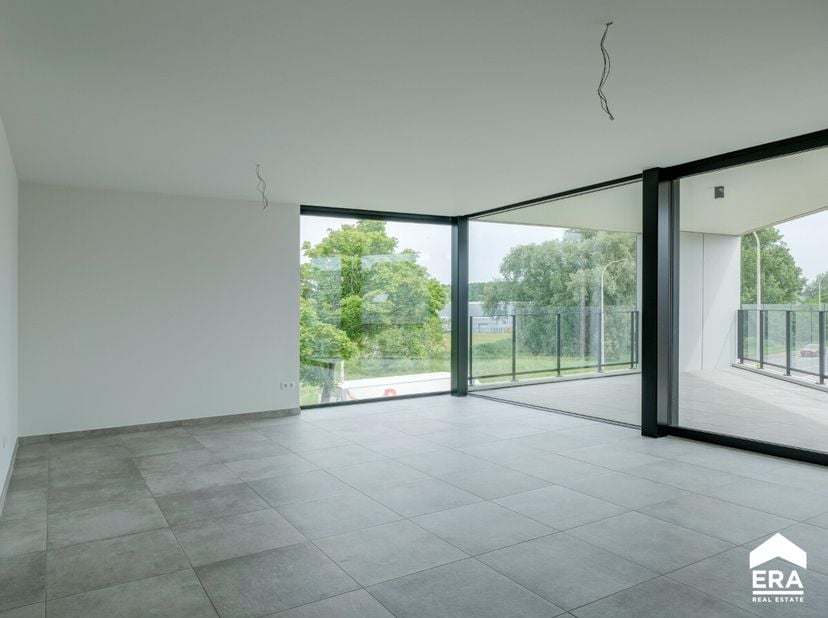 tapklaar luxeappartement met 3 slaapkamers, zonnig terras van 24m² inclusief een staanplaats en kelderberging in het centrum van Halen, op korte afsta