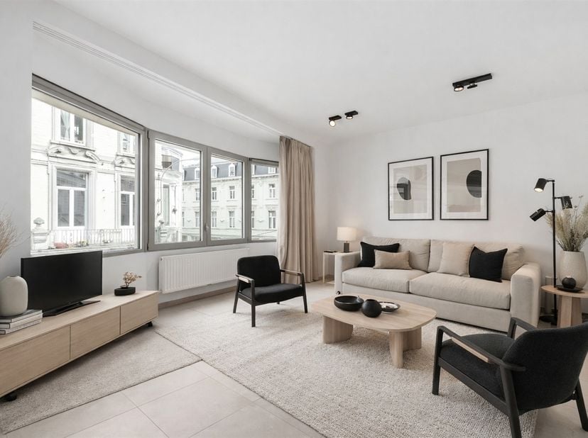 Ruim appartement met 2 slaapkamers, 2 badkamers op AAA-locatie! <br />
<br />
Dit kleinschalig en recent gerenoveerd gebouw bestaat uit 7 appartemen