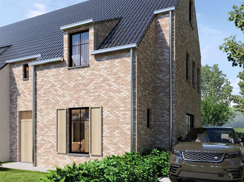 Dans la rue calme Elfenbergstraat à Kuringen, vous trouverez cette maison jumelée moderne et économe en énergie (maison de droite) sur un terrain de 4
