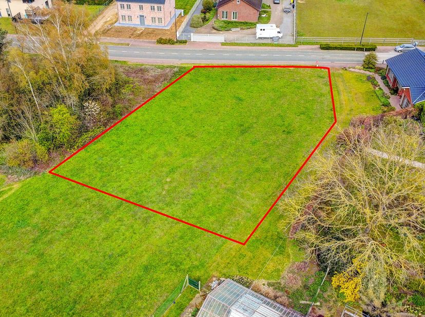 HULDENBERG - parcelle à côté de la maison numéro 36 - À proximité des écoles, des commerces et d'une nature magnifique, ce terrain de 11 ares et 48 ce