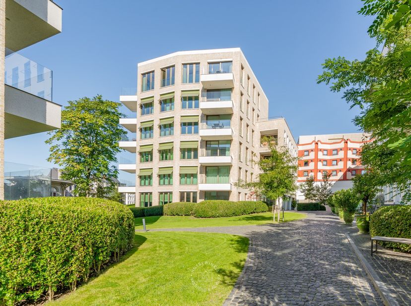 Dit luxueuze investeringsappartement is gelegen in de residentie Verdi, onderdeel van het nieuwbouwproject Leiekouter naar de hand van 360 Architecten