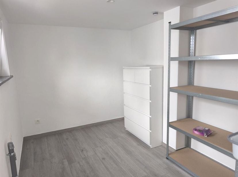 Ruime woning met 3 slaapkamers en tuin in Houthalen-Helchteren<br />
Ligging<br />
Deze verzorgde woning is gelegen aan het Koningsplein 1 in Houthale