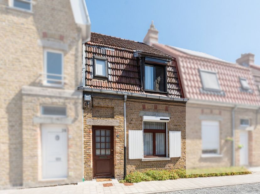 Knusse woning met tuin, garage en tal van mogelijkheden aan de buitenrand van Eeklo Op zoek naar een gezellige woning met potentieel, gelegen op een r