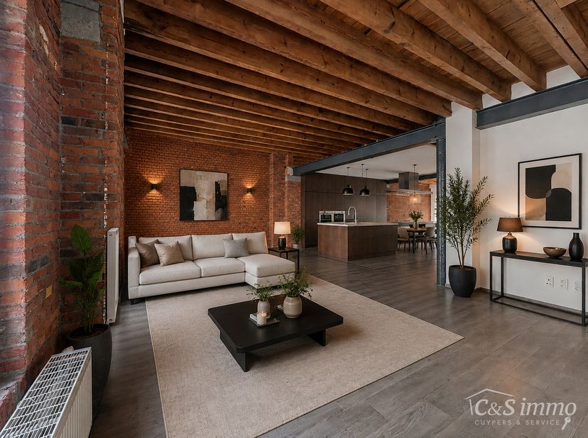 Ontdek dit loftappartement van 148 m² op een toplocatie in het bruisende Eilandje. Authentieke elementen zoals bakstenen muren, zichtbare houten balke