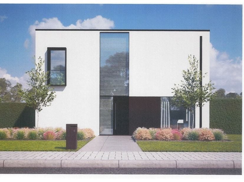 Située dans un environnement verdoyant et paisible à Groot Overlaar, à Tirlemont, cette magnifique maison neuve sur mesure est implantée sur un terrai
