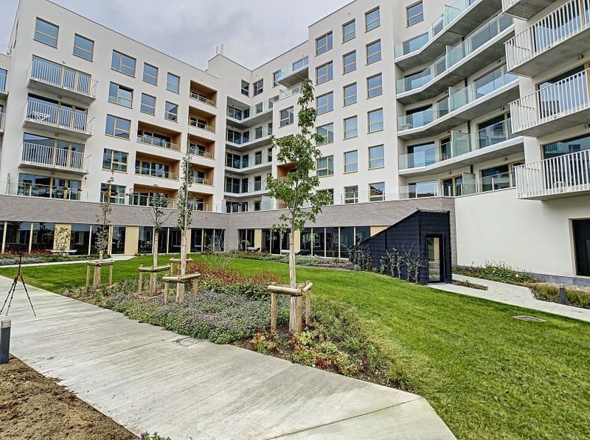 In het hart van Brussel, in de Brunfautwijk, is Home Invest Belgium erin geslaagd een voormalige semi-industriële site om te vormen tot comfortabele r