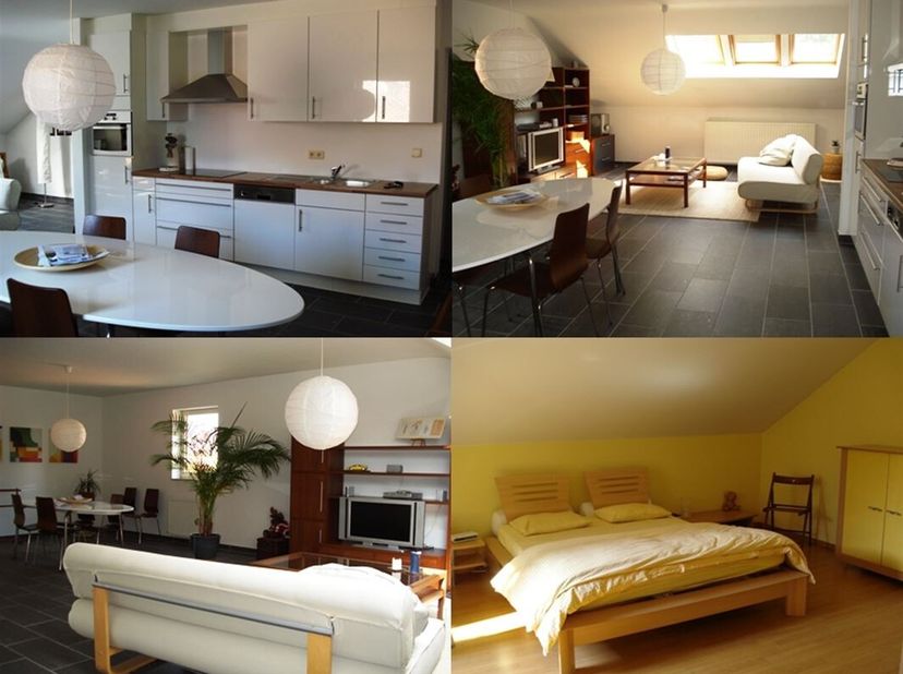Knappe en gezellige penthouse van 2003 vlakbij het centrum van Sint-Truiden met een inkomhal, een enorme  living met open keuken met veel lichtinval e