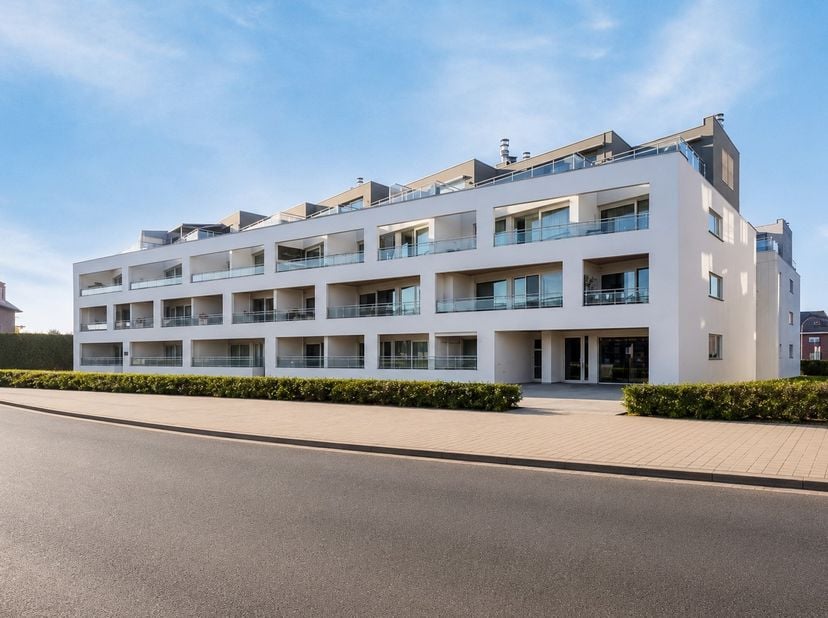 Het appartement, gelegen op het 1ste verdiep, beschikt over een lichtrijke leefruimte die naadloos aansluit op de open, volledig uitgeruste keuken. De