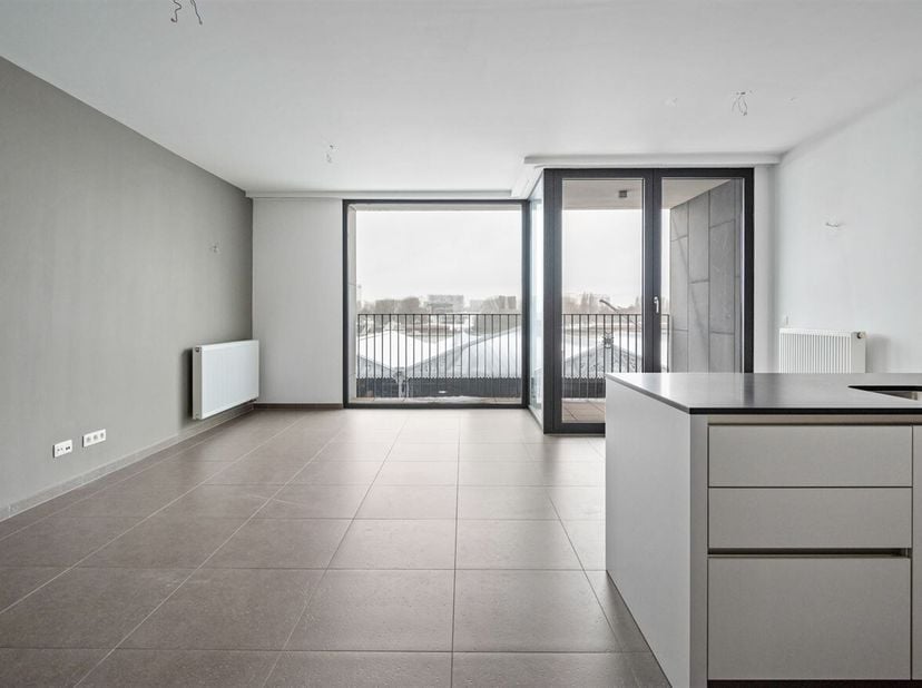 Luxe- appartement (90 m²) met terras aan de Scheldekaaien<br />
Ligging:<br />
Op een uitstekende locatie aan de Scheldekaaien, met een prachtig open