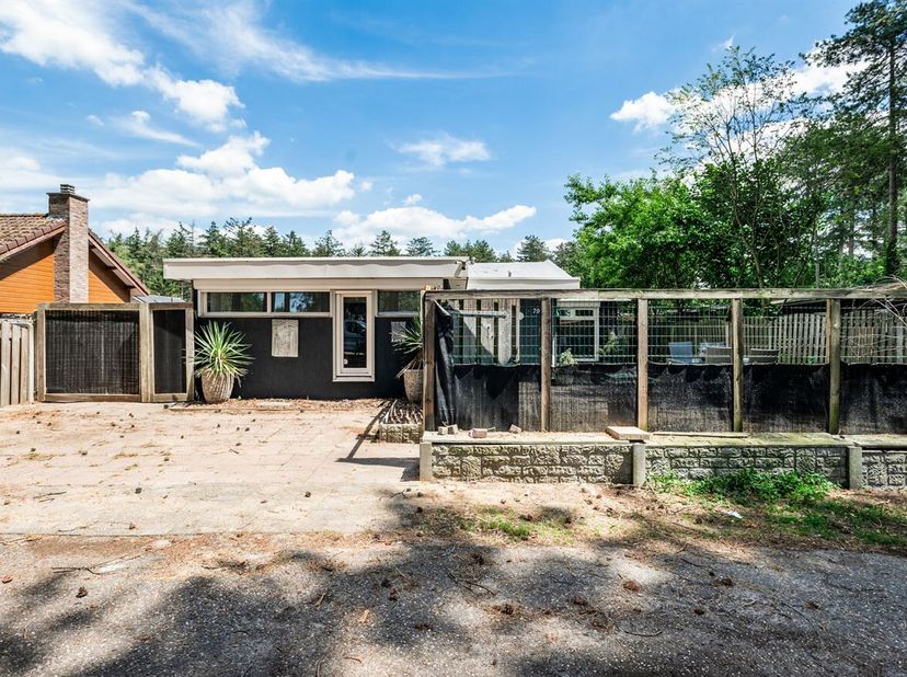 Situation :<br />
Ce chalet/gîte est situé dans un cadre très calme, au sein du domaine de loisirs de Tulderbos. Niché dans un cadre verdoyant, ce dom
