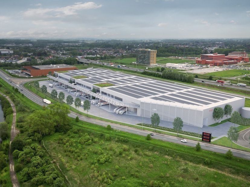 Nieuwbouw logistieke loods bestaande uit 8.625m² magazijn met 1.892m² mezzanine en 572m² kantoren<br />
Ligging: op eilandje Zwijnaarde, aan het klave