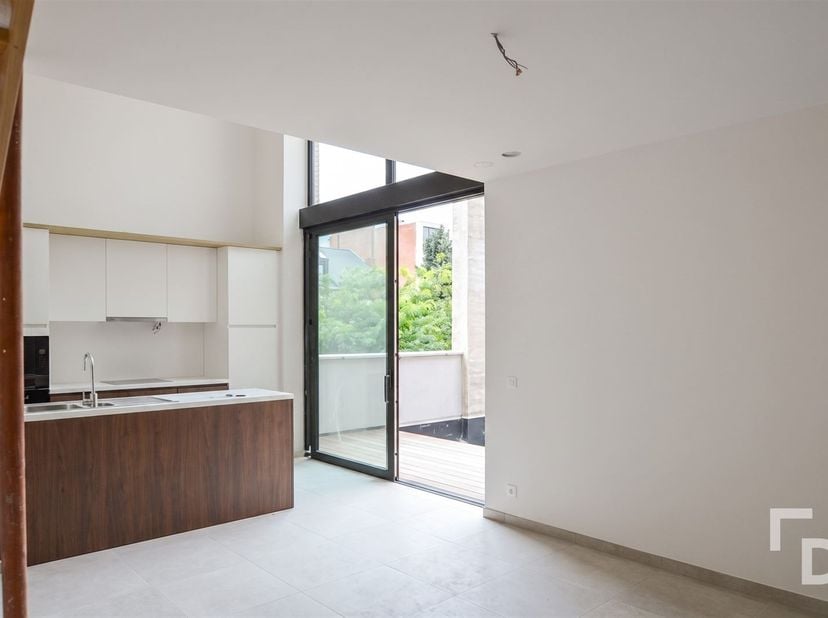 In de nieuwe residentie Melrose Place ontdek je dit prachtige en karaktervolle 1‑slaapkamer loft, gelegen in het hart van Ieper. <br />
Het project i