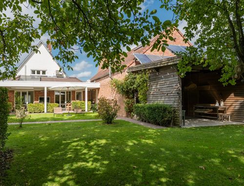                                         Handelspand met woonst te koop in Lommel, € 599.000
