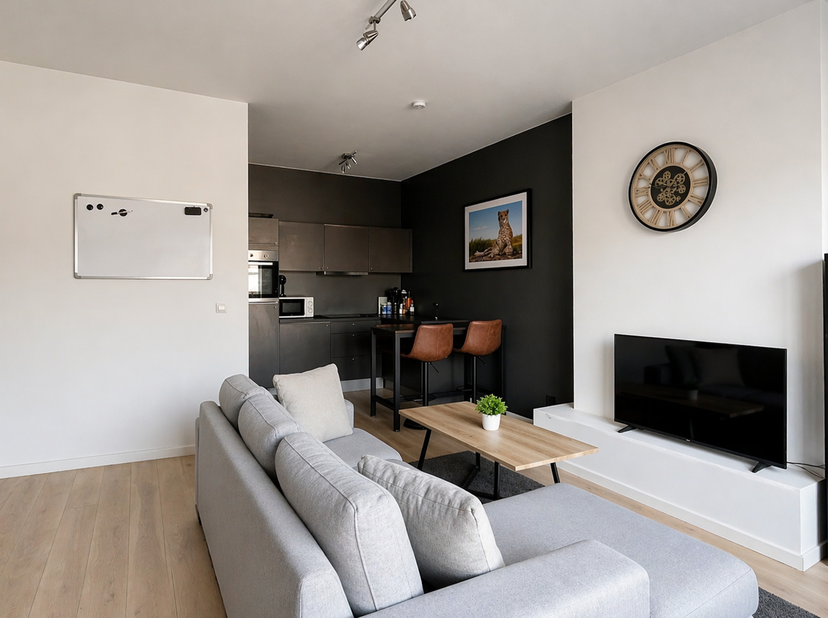 Dit sfeervolle appartement van ca 50 m² is gelegen op de tweede verdieping van een kleinschalige residentie in de Paleisstraat. Op wandelafstand van h