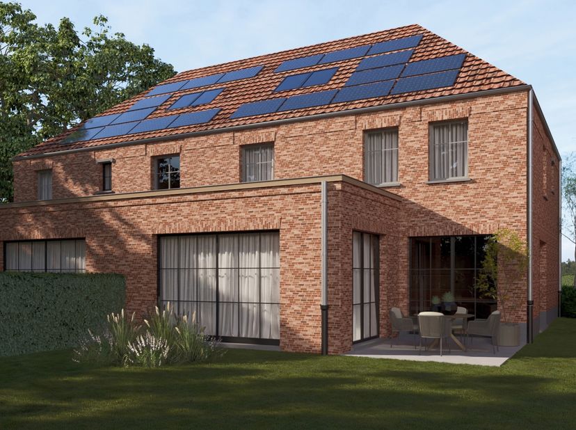 Lot 8 in het charmante project Vogelzang vormt een harmonieuze mix van karaktervolle architectuur en hedendaagse woonkwaliteit. Achter de stijlvolle g